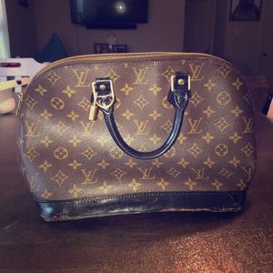Louis Vuitton Authentic...has some damage.